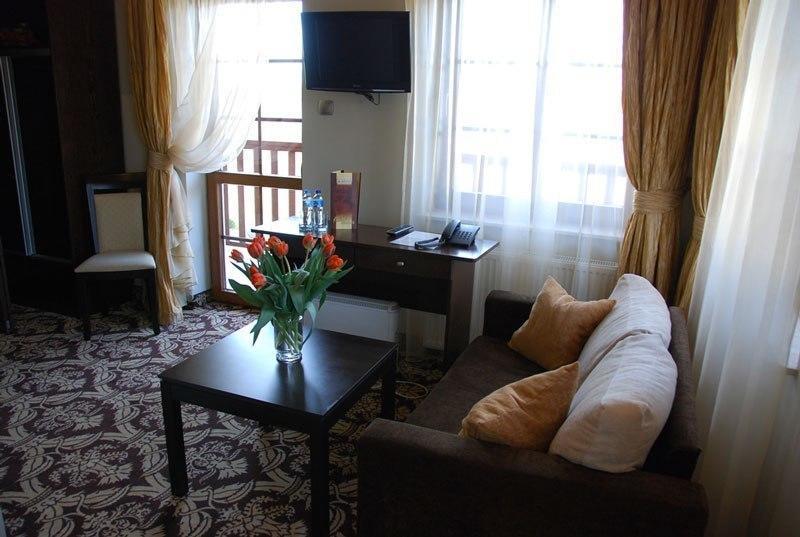 Hotel Sloneczny Brzeg Biskupiec  Rom bilde